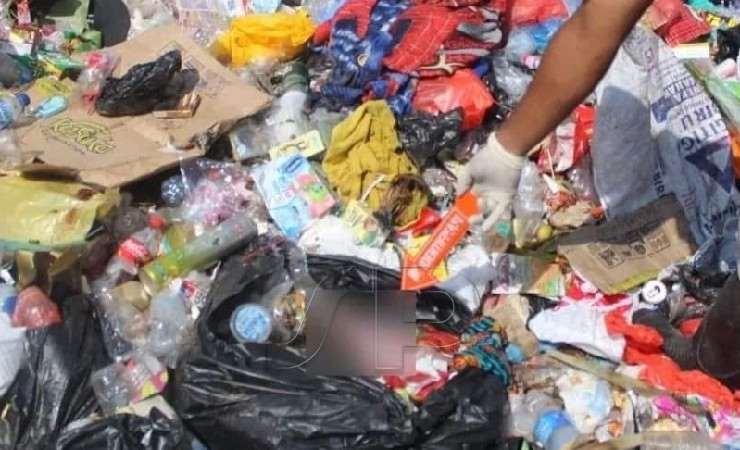 TEMUKAN | Jasad bayi berjenis kelamin perempuan ditemukan warga di lokasi pembuangan sampah belakang AURI, Kampung Doyo Lama, Kabupaten Jayapura, Papua, Jumat (24/6/2022). (Foto: Humas Polres Jayapura)