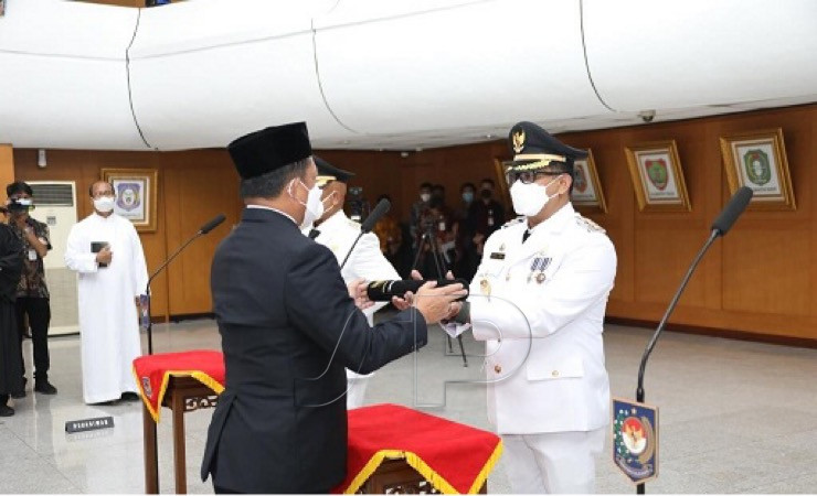 Menteri Dalam Negeri Tito Karnavian saat melantik Michael R. Gomar menjadi Penjabat Bupati Mappi, pada 27 Mei 2022.