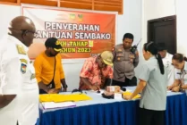 Pos Timika Serahkan 4.307 Bantuan Sembako KPM ke Kepala Distrik dan Kampung