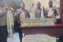 Ratusan Liter Sopi Disita Polisi di Pelabuhan Poumako