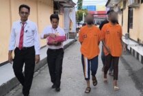 Tampak dua pelaku persekusi ditangkap Satuan Reskrim Polres Jayapura. (Foto: Firga/Seputarpapua)