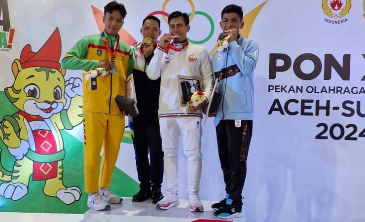 Atlet Papua Tengah, Wahyu Resa Ardiansyah (kanan ujung) meraih medali perunggu PON XXI Aceh-Sumut dari cabor Jujitsu. (Foto: Ist/Joe Situmorang)