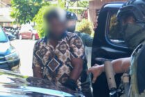 Jemmy Magai Yogi terlihat dijaga ketata oleh Ops Damai Cartensz, saat tiba di Polda Papua. (Foto: Ops Damai Cartensz 2024)